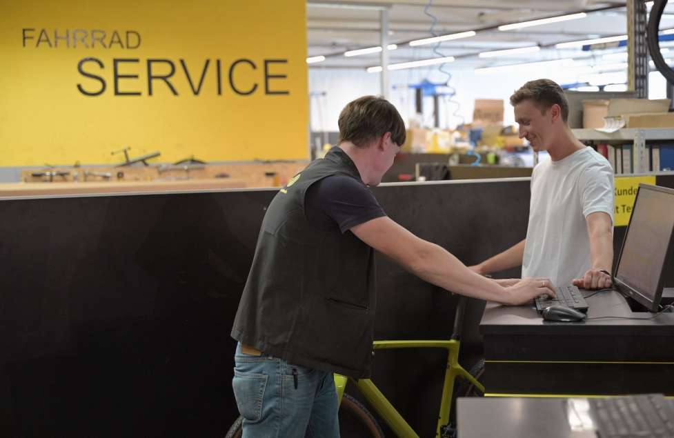 a Stadler customer service representative serving a customer