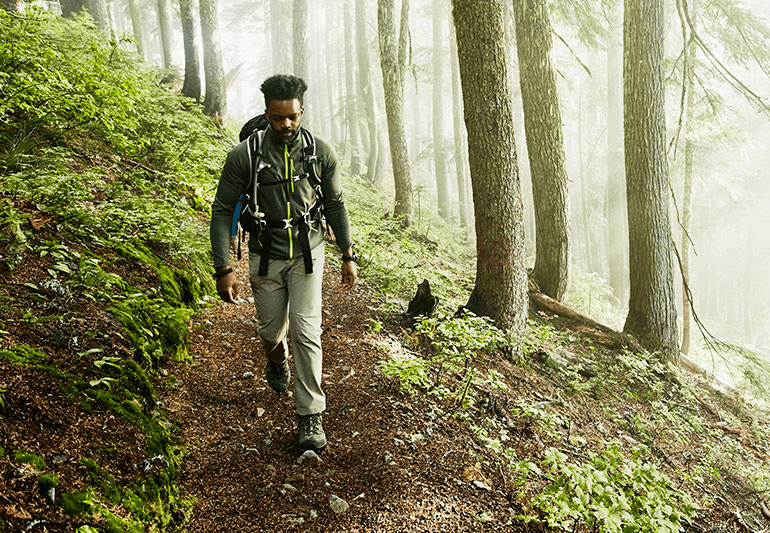 stock image of a man going on a hiking 