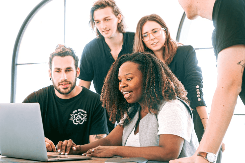 stock image of a group working together on a new project 