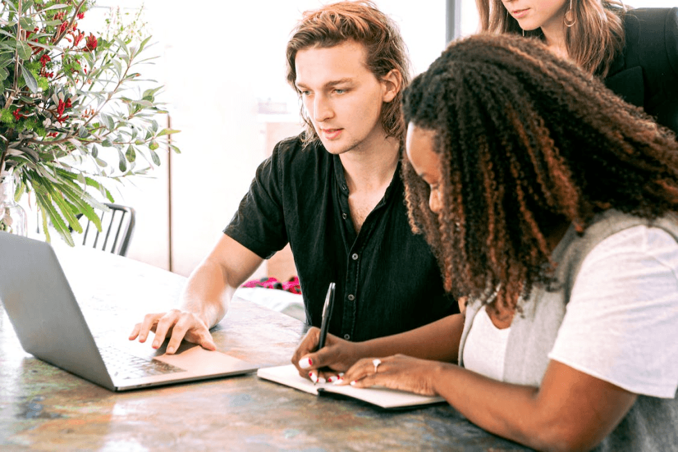 stock image of people working together 